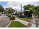 Street view near businesses and attractions, featuring sidewalks and a train track at 219 N Rossiter St, Mount Dora, FL 32757