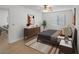 Well-lit bedroom with ceiling fan, closet, and contemporary decor at 2210 Stonington Ave # 2210, Orlando, FL 32817