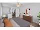 Comfortable bedroom featuring a ceiling fan, closet, and stylish decor at 2210 Stonington Ave # 2210, Orlando, FL 32817