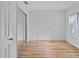 Bright bedroom featuring sleek mirrored closet doors and natural light at 2210 Stonington Ave # 2210, Orlando, FL 32817