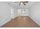 An open living room featuring neutral walls and hard surface floors at 2210 Stonington Ave # 2210, Orlando, FL 32817