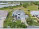 Beautiful single-story home with a well-manicured lawn and lush landscaping provides curb appeal at 22247 Draw Bridge Dr, Leesburg, FL 34748