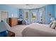 Spacious main bedroom with lots of natural light and neutral carpet at 22247 Draw Bridge Dr, Leesburg, FL 34748