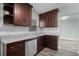 Modern kitchen featuring granite countertops, stainless steel appliances, and shaker cabinets at 234 S Central Ave, Apopka, FL 32703