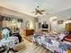 Bedroom suite featuring wood floors, neutral paint, and lots of natural light at 24112 Robinwood St, Leesburg, FL 34748