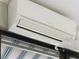 Modern Mitsubishi electric air conditioning unit, offering efficient climate control for comfortable living at 24112 Robinwood St, Leesburg, FL 34748
