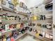 Large pantry with plenty of shelving for optimized storage at 24112 Robinwood St, Leesburg, FL 34748