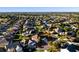 Aerial view of a home in a well-established neighborhood with mature landscaping and easy access to local amenities at 2428 Maverick Way, The Villages, FL 32162