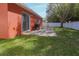The house's backyard includes a concrete patio, grill, and basketball hoop at 2442 Foxhollow Rd, Tavares, FL 32778