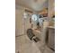 This bright bathroom offers a soaking tub, a view from the window, and a coastal decor theme at 2442 Foxhollow Rd, Tavares, FL 32778