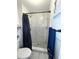 Bathroom with marble walk-in shower, modern fixtures, and elegant design elements create a luxurious bathing experience at 2442 Foxhollow Rd, Tavares, FL 32778