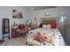 Charming bedroom featuring bright decor, stylish furnishings, and a decorative Paris themed motif at 2442 Foxhollow Rd, Tavares, FL 32778