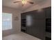 Compact, flexible bedroom with a built-in murphy bed and abundant storage in a contemporary style at 2442 Foxhollow Rd, Tavares, FL 32778