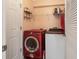 Convenient laundry room with washer and dryer at 27121 Greenfly Orchid Ln, Leesburg, FL 34748