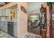 Open-concept living area seamlessly connects to the kitchen at 27121 Greenfly Orchid Ln, Leesburg, FL 34748