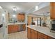 Charming kitchen with stainless steel appliances, granite countertops, and tile flooring at 28416 Tammi Dr, Tavares, FL 32778