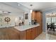 Open kitchen featuring custom cabinetry, quartz countertops, and an island at 28416 Tammi Dr, Tavares, FL 32778
