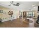 Open living room with nautical-themed decor and new hardwood flooring at 28416 Tammi Dr, Tavares, FL 32778