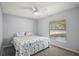Bedroom includes neutral walls and a window with blinds at 331 W Lewis Ave, Apopka, FL 32712