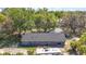 Aerial back view of a one-story house, with a gray roof, and an RV in the driveway at 331 W Lewis Ave, Apopka, FL 32712
