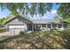 Charming single-story home with a well-maintained lawn at 331 W Lewis Ave, Apopka, FL 32712