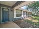 Inviting front entrance with a covered porch and stylish door at 331 W Lewis Ave, Apopka, FL 32712