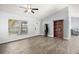 Spacious living room featuring wood flooring and vaulted ceiling at 331 W Lewis Ave, Apopka, FL 32712