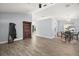 Spacious living room featuring wood flooring and vaulted ceiling at 331 W Lewis Ave, Apopka, FL 32712