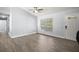 Spacious living room featuring wood flooring and vaulted ceiling at 331 W Lewis Ave, Apopka, FL 32712