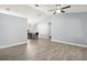 Spacious living room featuring wood flooring and vaulted ceiling at 331 W Lewis Ave, Apopka, FL 32712