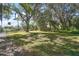 Beautiful property with mature trees and lush greenery, offering a tranquil and picturesque setting at 331 W Lewis Ave, Apopka, FL 32712