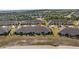 An aerial view displays a lovely home and its picturesque surroundings in a well maintained community at 3512 Belland Cir # B, Clermont, FL 34711