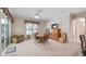 A cozy dining room featuring a round table and comfortable seating at 3728 Mulberry Grove Loop, Leesburg, FL 34748