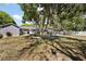 This expansive backyard features a storage shed and outdoor seating area at 3860 Branch Ave, Mount Dora, FL 32757