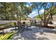 Enjoyable backyard offers outdoor dining area with seating, perfect for entertaining at 3860 Branch Ave, Mount Dora, FL 32757
