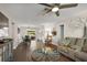 Spacious open-concept floor plan with sleek flooring and natural light with modern furniture at 3860 Branch Ave, Mount Dora, FL 32757