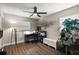 Home office with ample desk space, natural light, and wood-look flooring at 3860 Branch Ave, Mount Dora, FL 32757