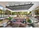 Inviting screened patio with comfortable seating and views of the backyard at 3860 Branch Ave, Mount Dora, FL 32757