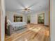 Bright bedroom with hardwood floors and lots of natural light at 39636 Carolina Ave, Lady Lake, FL 32159