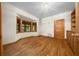 Bedroom featuring a bay window, hardwood floors, a closet and built in cabinetry at 39636 Carolina Ave, Lady Lake, FL 32159