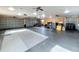 Expansive garage interior featuring multiple bays and versatile space for parking and workshop activities at 5813 Lake Emma Ct, Groveland, FL 34736