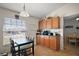 Cozy eat-in kitchen area with natural light and ample cabinet space at 638 Sierra Cir, Davenport, FL 33837