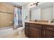 Full bathroom with a decorative shower curtain and a single sink vanity with counter space at 6679 Cr 613, Bushnell, FL 33513