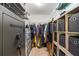 Walk-in closet with metal shelving and a large safe at 6679 Cr 613, Bushnell, FL 33513