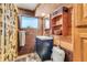 Charming bathroom features brick accent wall, wood paneling, and modern fixtures at 6988 Blue Cedar Rd, Leesburg, FL 34748