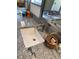 Granite countertop features a stylish sink, faucet, and basket, adding a touch of elegance to the bathroom at 737 Caldwell Ct, The Villages, FL 32162