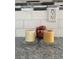 Detailed view of countertop decor with candles on glass coasters and subway tile backsplash at 737 Caldwell Ct, The Villages, FL 32162