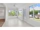 Bright Florida Room featuring tile floors, plenty of natural light, and a ceiling fan at 737 Caldwell Ct, The Villages, FL 32162
