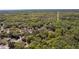 Aerial view of a lot surrounded by lush greenery, set in a tranquil residential area at 801 Kilgore St, Wildwood, FL 34785