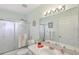 Clean bathroom featuring a shower, updated vanity, and fixtures at 9857 Sw 63Rd Ct, Ocala, FL 34476